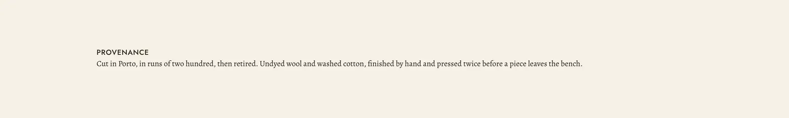 The Lapels Custom Liquid section: a narrow band on the pale ground carrying the small capitalized label "PROVENANCE" above a single line of body text reading "Cut in Porto, in runs of two hundred, then retired. Undyed wool and washed cotton, finished by hand and pressed twice before a piece leaves the bench."