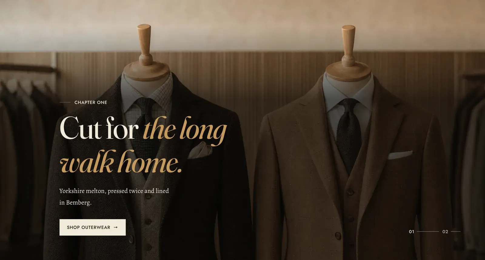 The Lapels Hero scroll sequence section: a full-bleed photograph of two suits on tailor's forms in a dim fitting room, washed dark from the bottom, carrying the label "Chapter one", the heading "Cut for the long walk home." with the last four words in italic, a line reading "Yorkshire melton, pressed twice and lined in Bemberg.", a "Shop outerwear" button, and a progress marker reading 01 of 02 in the lower right.